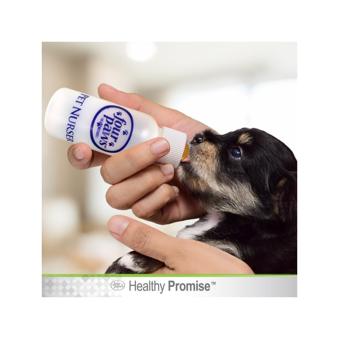 Four Paws Healthy Promise Pet Nurser Bottle with Brush Kit side view with ergonomic design and nipple brush included.