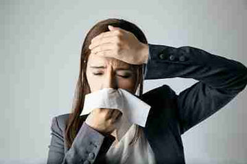A pet owner experiencing allergies, possibly from Timothy Hay.