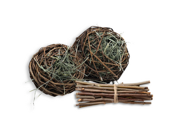 stuffable willow chew balls with hay and a bundle of apple sticks