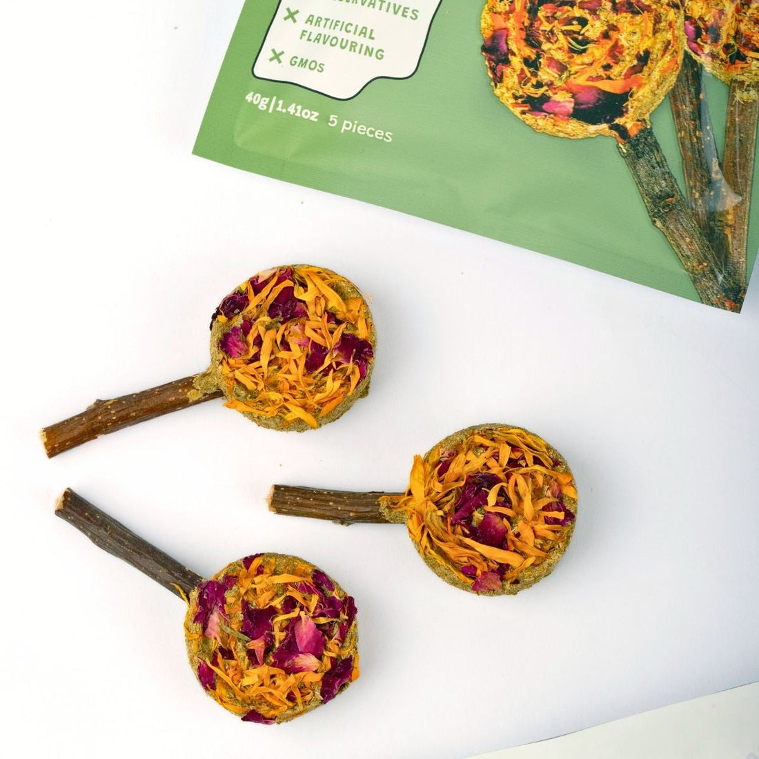 Forage pops lollipop-style hay treats for small animals like rabbits and guinea pigs
