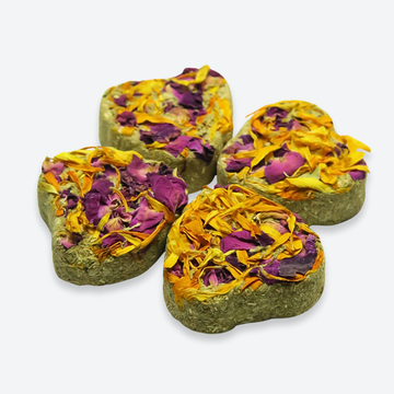 Hayflower Minicakes heart-shaped hay treats topped with rose and calendula petals for rabbits, guinea pigs, and other small a