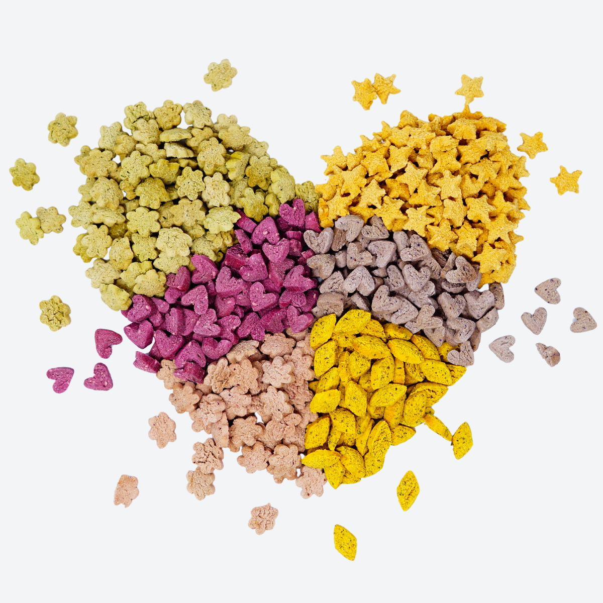 Assorted crunchy fruit and vegetable treats for small pets in heart and star shapes